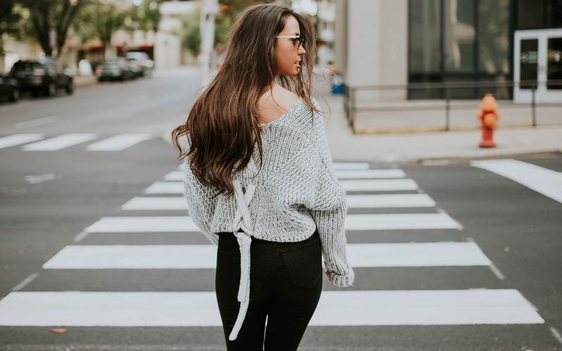 a person walking in a crosswalk