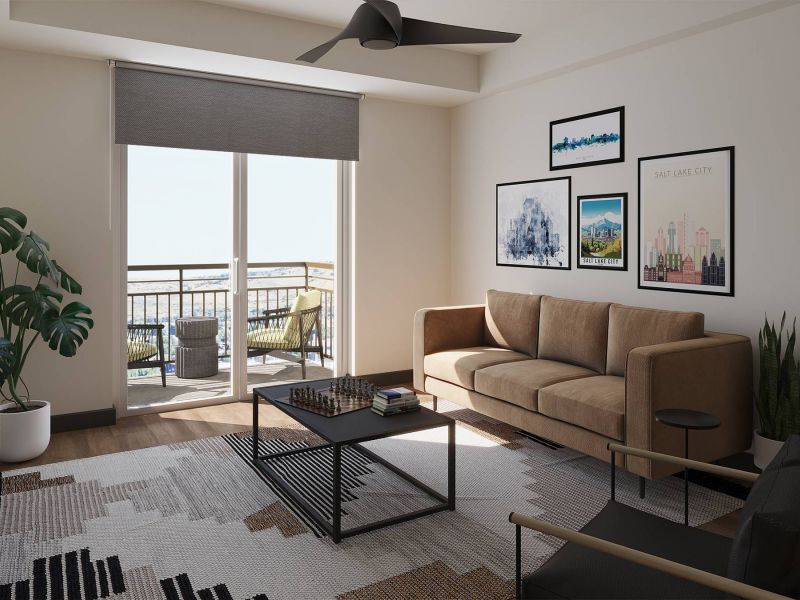Montaire Student Living Apartments Modern living room with a tan sofa, wall art, large window, and balcony view.