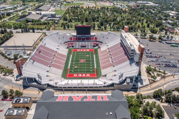 Montaire Student Living Apartments Aerial view of Rice-Eccles Stadium, the football field for the University of Utah, surrounded by parking lots.